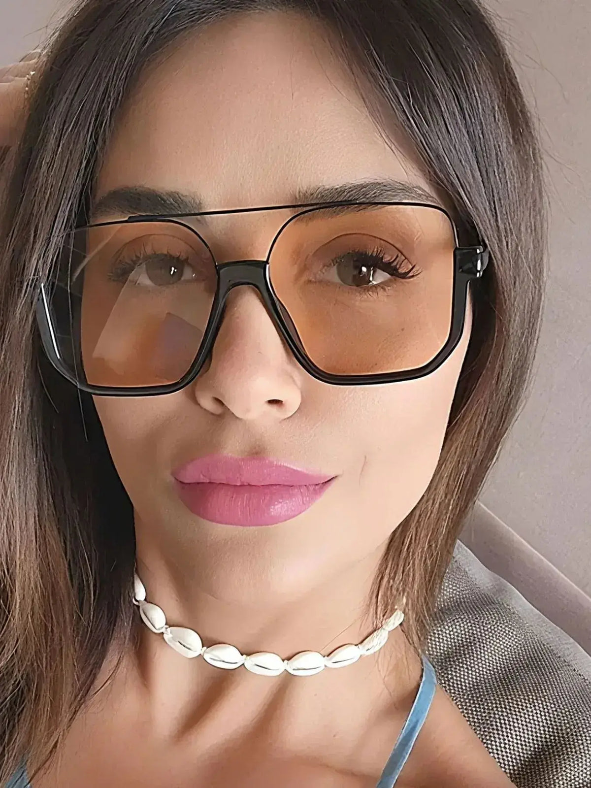 Oversized Square Frame Fashion Sunglasses worn by a woman with light makeup and a shell choker.