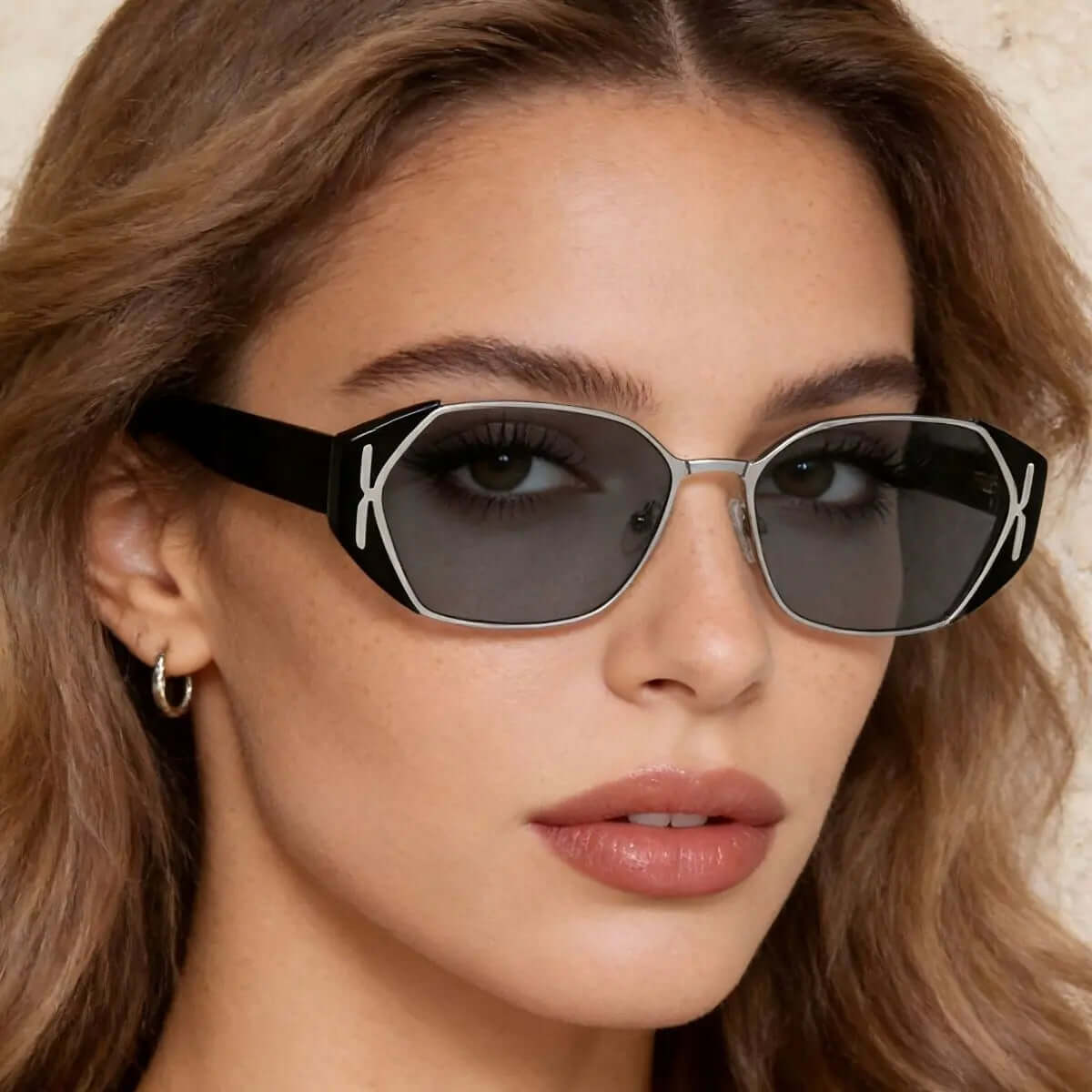 Model wearing UV Protection Geometric Sunglasses with a stylish black frame and dark lenses.