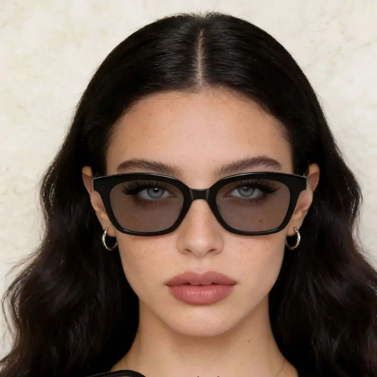 UV Protection Sunglasses showcased on model, emphasizing stylish eye protection and health benefits.